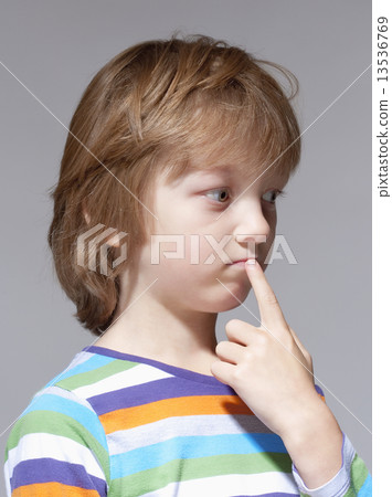 Portrait of a Boy with Blond Hair Thinking 13536769