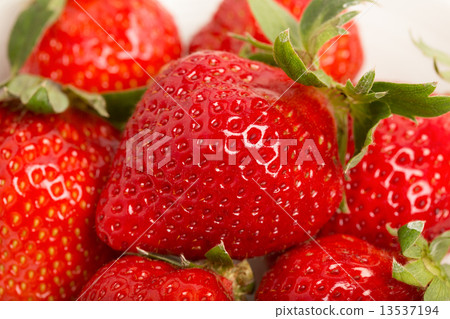 Strawberries overflow 13537194