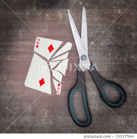 Concept of addiction, card with scissors Concept of addiction, card with scissors 13537564