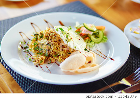 Mie goreng - traditional Indonesian meal 13542379
