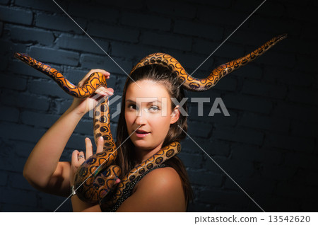 Woman and snake 13542620