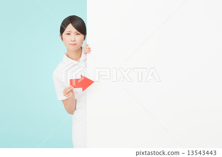 A nurse that points the message board with an arrow 13543443