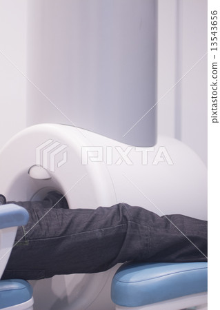 Patient and Doctor in fully open MRI CAT Scan 13543656