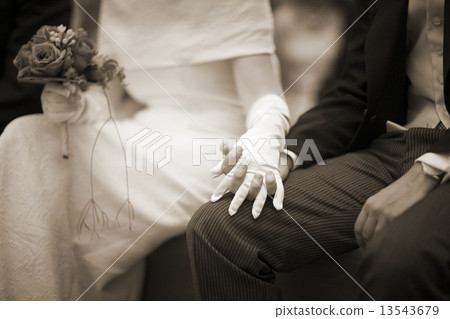 Hands of bride and bridegroom in wedding marriage ceremony Hands of bride and bridegroom in wedding marriage ceremony 13543679