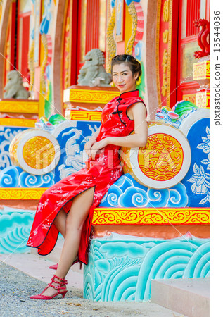 Chinese woman in red dress traditional, Cheongsam. Chinese woman in red dress traditional, Cheongsam. 13544036