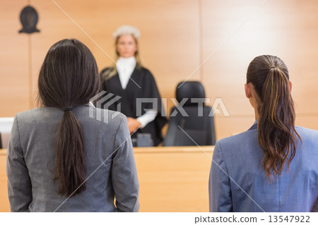 Lawyers listening to the judge Lawyers listening to the judge 13547922