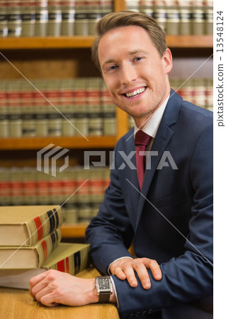 Handsome lawyer in the law library 13548124
