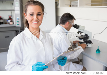 Team of scientists at work 13548466