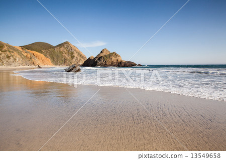 Tranquil beach in Pfeiffer state beach, California 13549658
