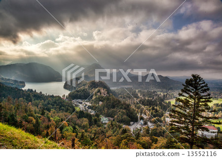 Schwangau lake in Bavaria Alps against sunset, Germany Schwangau lake in Bavaria Alps against sunset, Germany 13552116