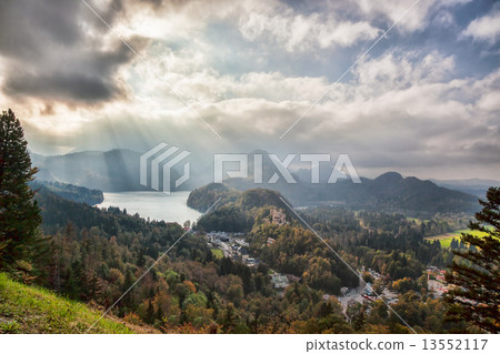 Schwangau lake in Bavaria Alps against sunset, Germany 13552117