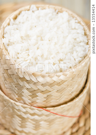 Khao Niao - Sticky rice in a traditional Lao/Thai bamboo basket  13554414