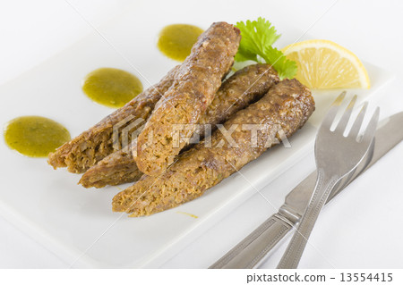 Seekh Kebabs - Minced meat kebabs with mint and coriander sauce.  13554415