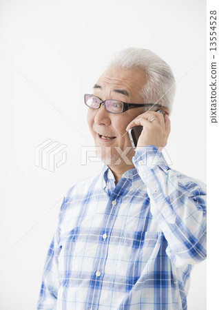 Senior male with phone Senior male with phone 13554528