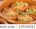Tomates al Ajillo (Tomatoes with garlic). Spanish tapas dish.  13554581