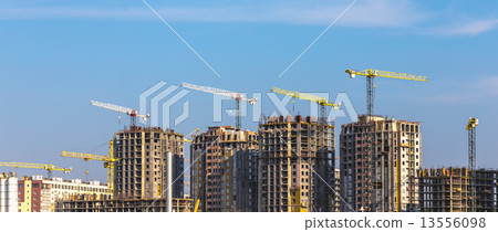 Building cranes on construction Building cranes on construction 13556098