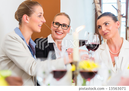Business lunch in restaurant with food and wine 13563071