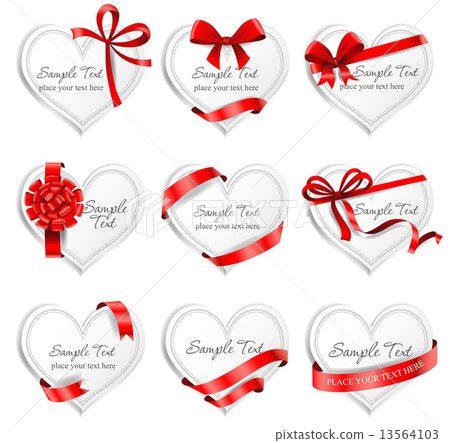 Festive heart-shaped  cards with red gift ribbons.  13564103