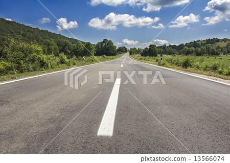 Empty country road 13566074