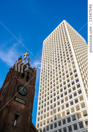 Church and modern building. 13567040