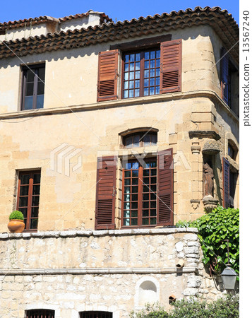 rural sandstone house with wood shutters, Provence, France rural sandstone house with wood shutters, Provence, France 13567240