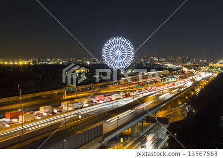 Ferris wheel with the capital high speed bay line of the night 13567563