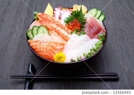 Bowl of rice topped with sashimi Bowl of rice topped with sashimi 13568493