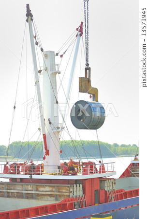 Rolls of steel sheet in the harbor 13571945
