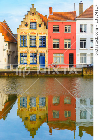 Scenic city view of Bruges canal with beautiful houses 13574117