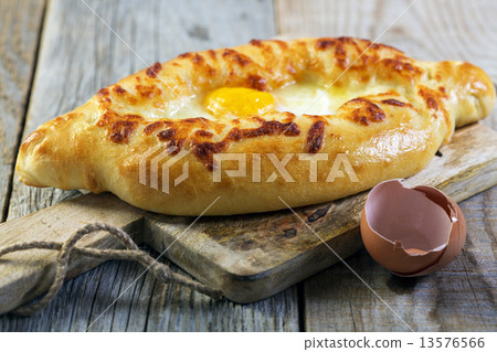 Georgian cheese pie and egg yolk. 13576566