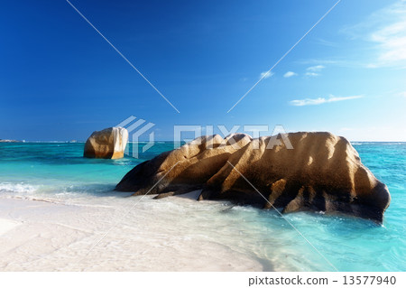 sunset on the beach, Anse Source d'Argent, La Digue island, Seys sunset on the beach, Anse Source d'Argent, La Digue island, Seys 13577940