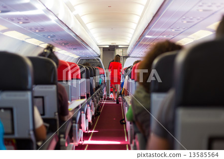Stewardess on the airplane. 13585564