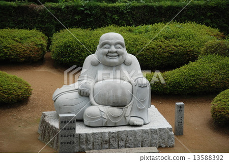 Stock Photo: hotei, stone statue, luck