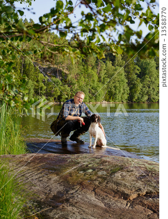 Hunter and puppy 13588770