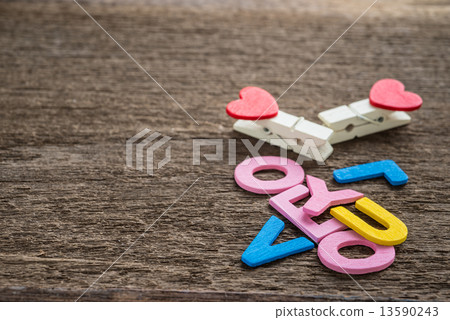 Love message written on wood background Love message written on wood background 13590243