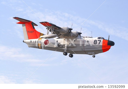 Maritime Self-Defense Force US-1A rescue flying boat flying against the blue sky Maritime Self-Defense Force US-1A rescue flying boat flying against the blue sky 13592099