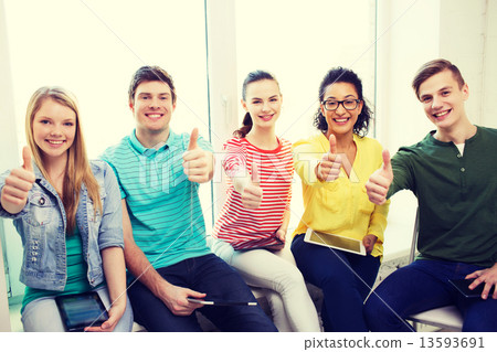 Stock Photo: students with tablet pc computers at school