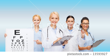 smiling female eye doctors and nurses smiling female eye doctors and nurses 13593927