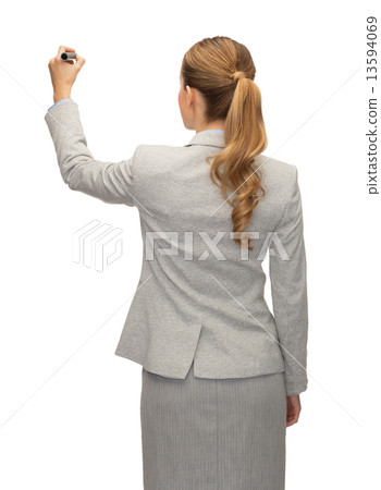 businesswoman or teacher with marker from back 13594069