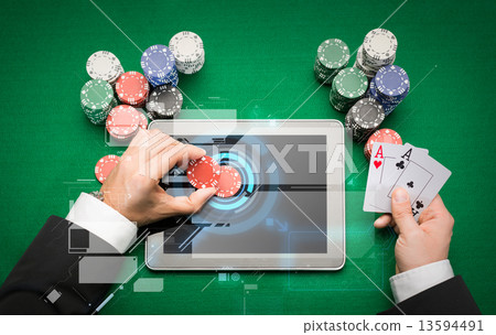 casino poker player with cards, tablet and chips casino poker player with cards, tablet and chips 13594491