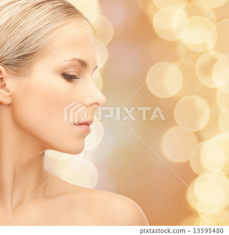 beautiful young woman face 13595480