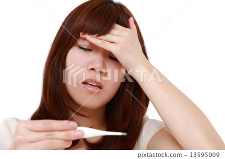 A woman measuring heat 13595909