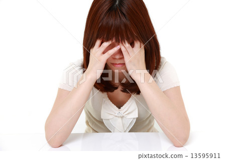 A despairing woman 13595911