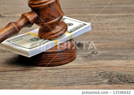 Wad of Money and Judges Gavel 13596682