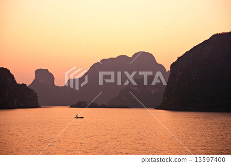 Sunset in Halong Bay, Vietnam. Unesco World Heritage Site. Sunset in Halong Bay, Vietnam. Unesco World Heritage Site. 13597400