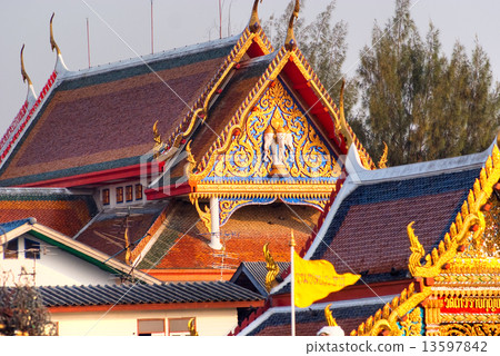 Temple and house on the Chao Praya River, bangkok, Thailand.. 13597842