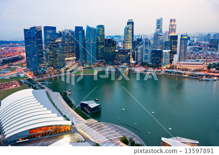 Singapore city skyline at sunset. 13597891