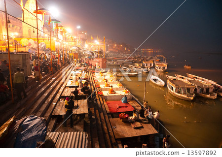 VARANASI - DECEMBER 13: Hindu priests during religious Ganga Aar 13597892