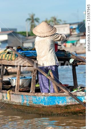 Boats in a harbor in the Mekong delta, Can Tho, Vietnam 13597945