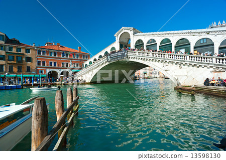 Venice, italy - March 06, 2011: Peoples watching the Grand Canal 13598130